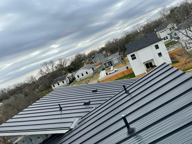 Standing seam metal roof panels with vents for Skylight Repair in Olmsted Falls